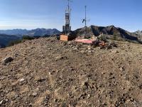 Looking south-southwest on Mount Baldy at the weather telemetry sensors and ski patrol equipment.